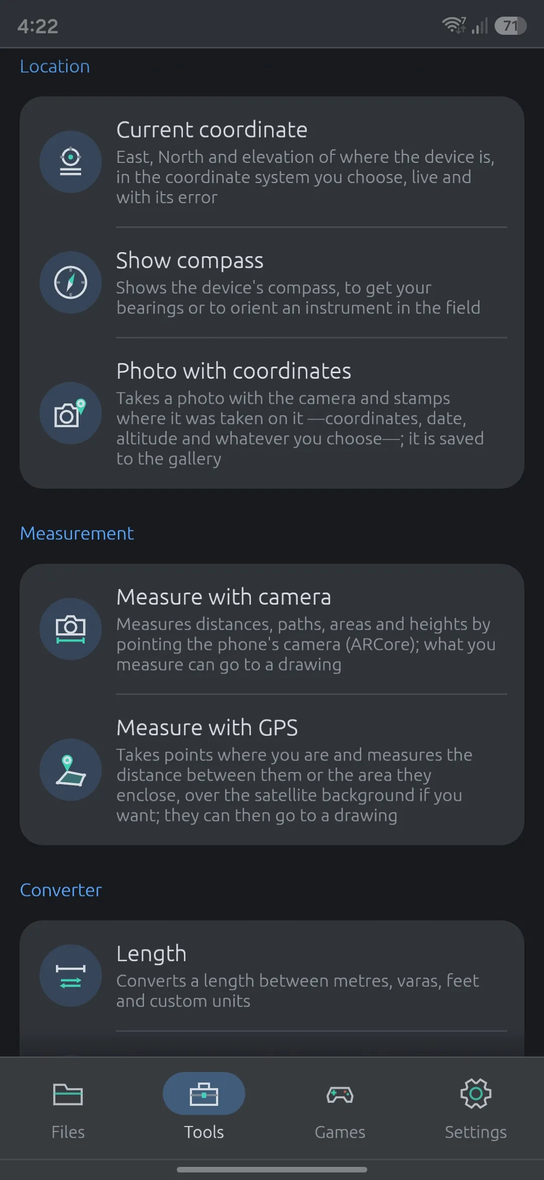 The Tools section on the phone: Current coordinate, Show compass and Photo with coordinates under Location, Measure with camera and Measure with GPS under Measurement, and the Converter